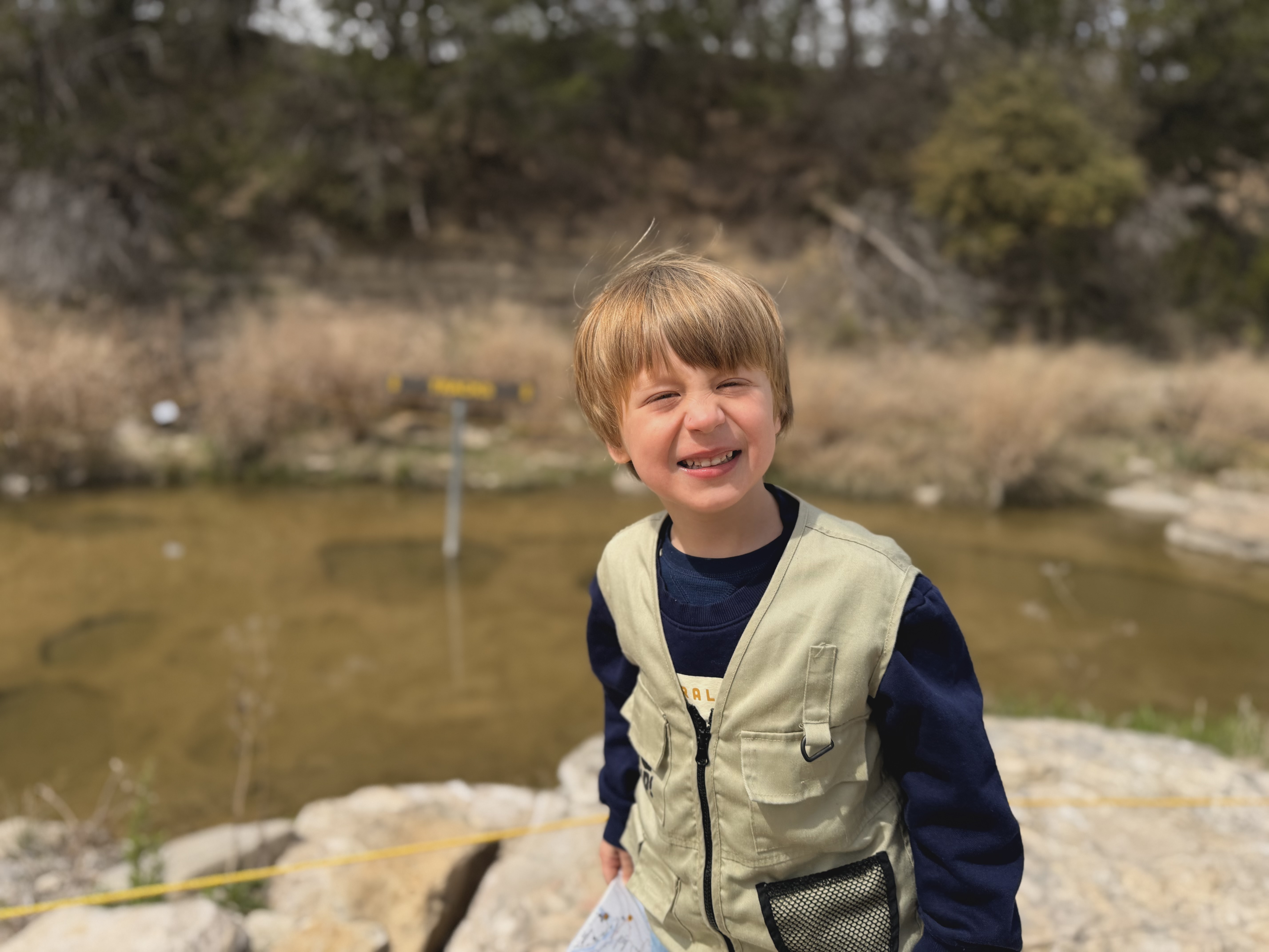 Gus smiling at the dinosaur track site