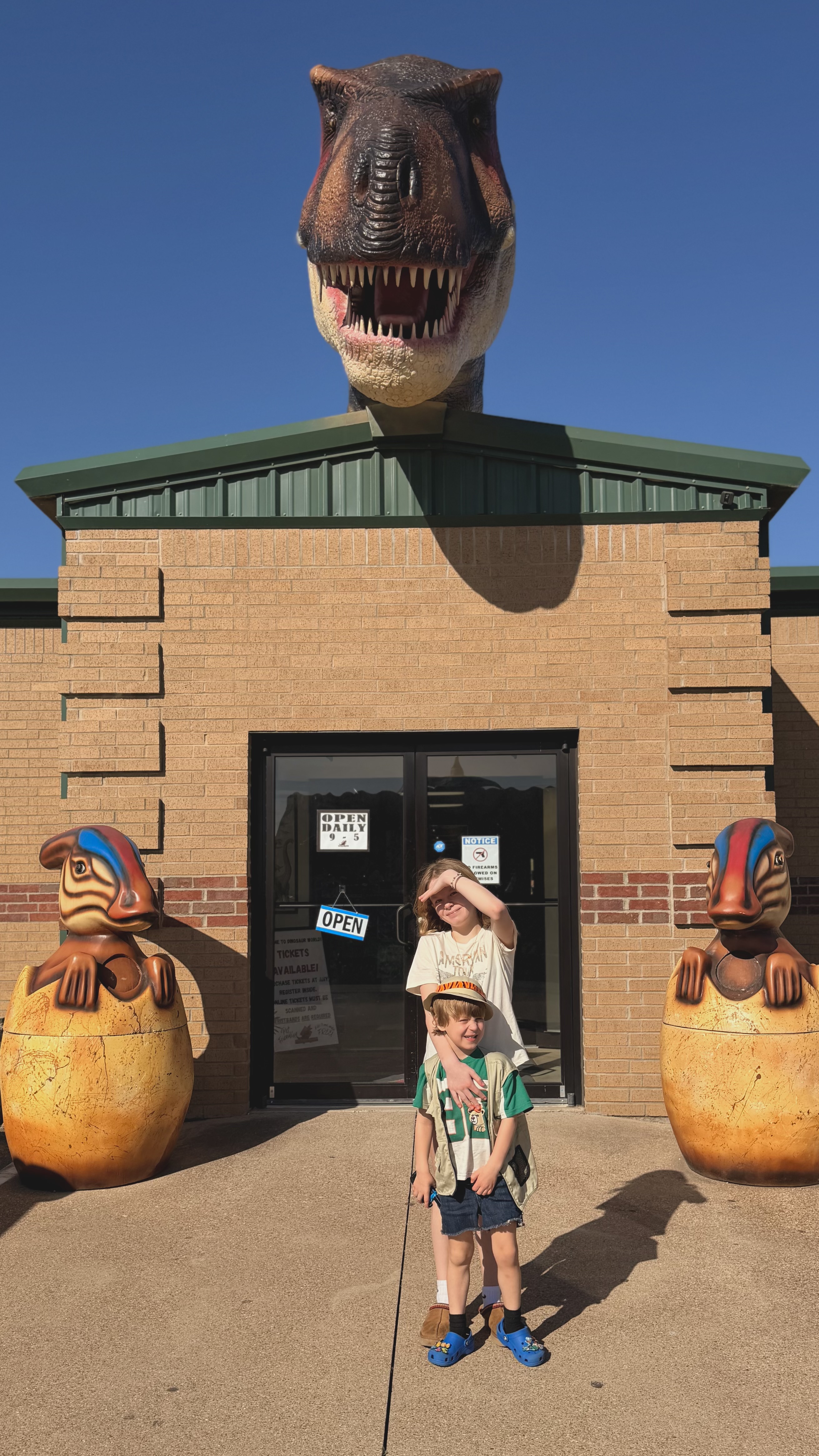 Ruby and Gus at the Dinosaur World entrance